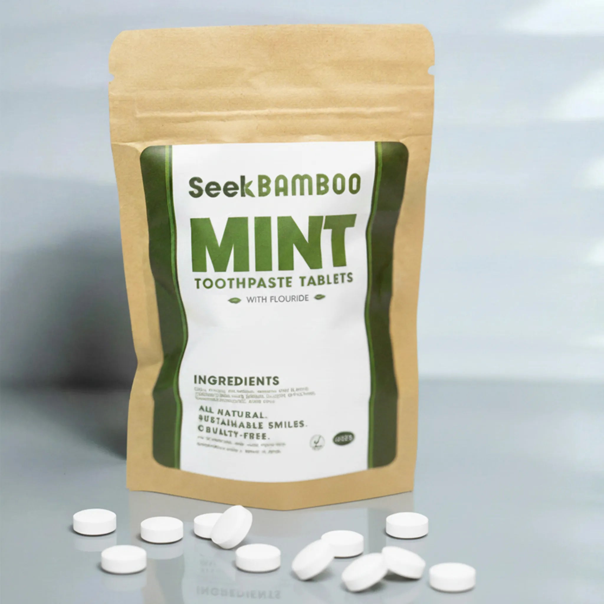 Seek Bamboo Mint Toothpaste Tablets packaging with tablets on a gray background