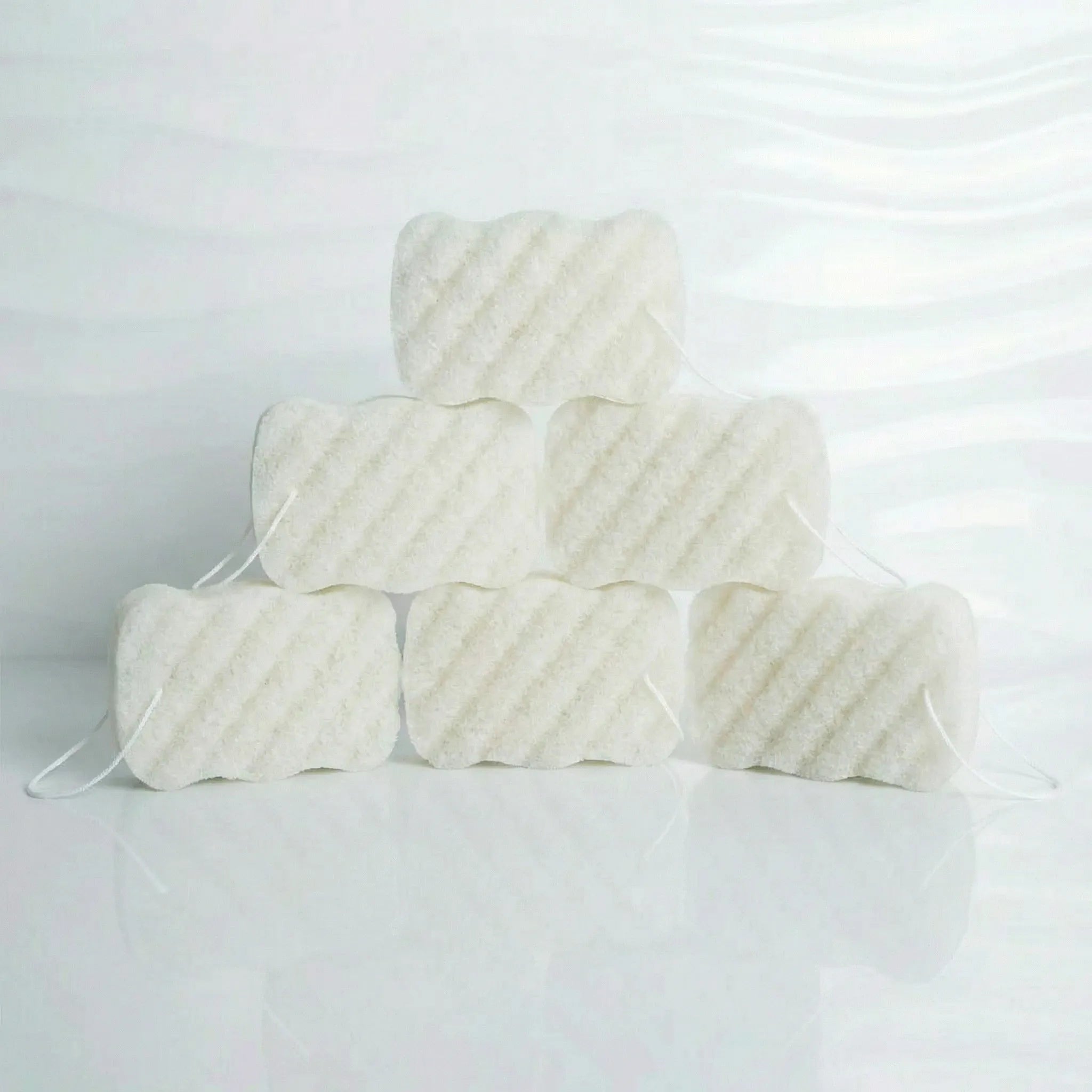 six white konjac sponges for body