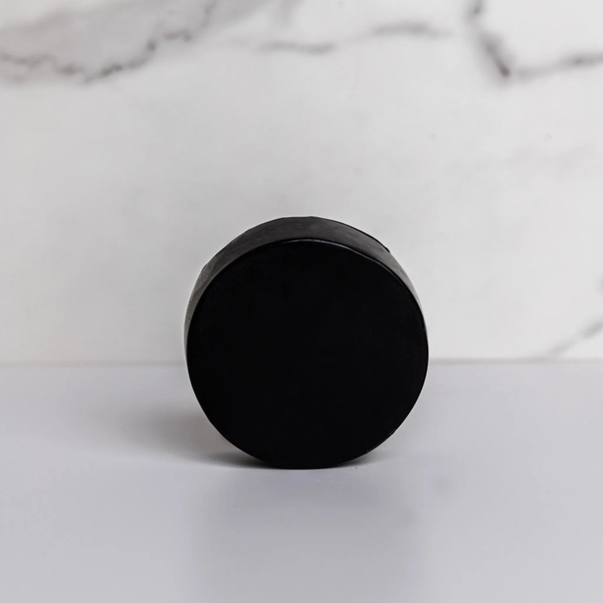 charcoal conditioner standing on its side