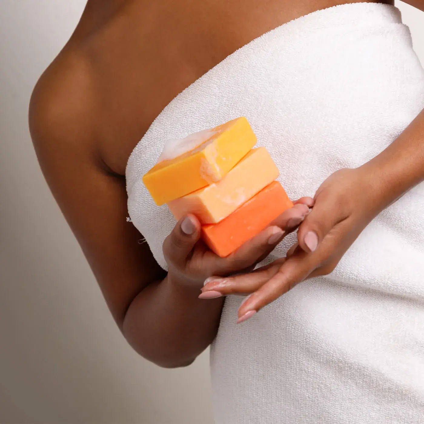 woman holding the best honey soap