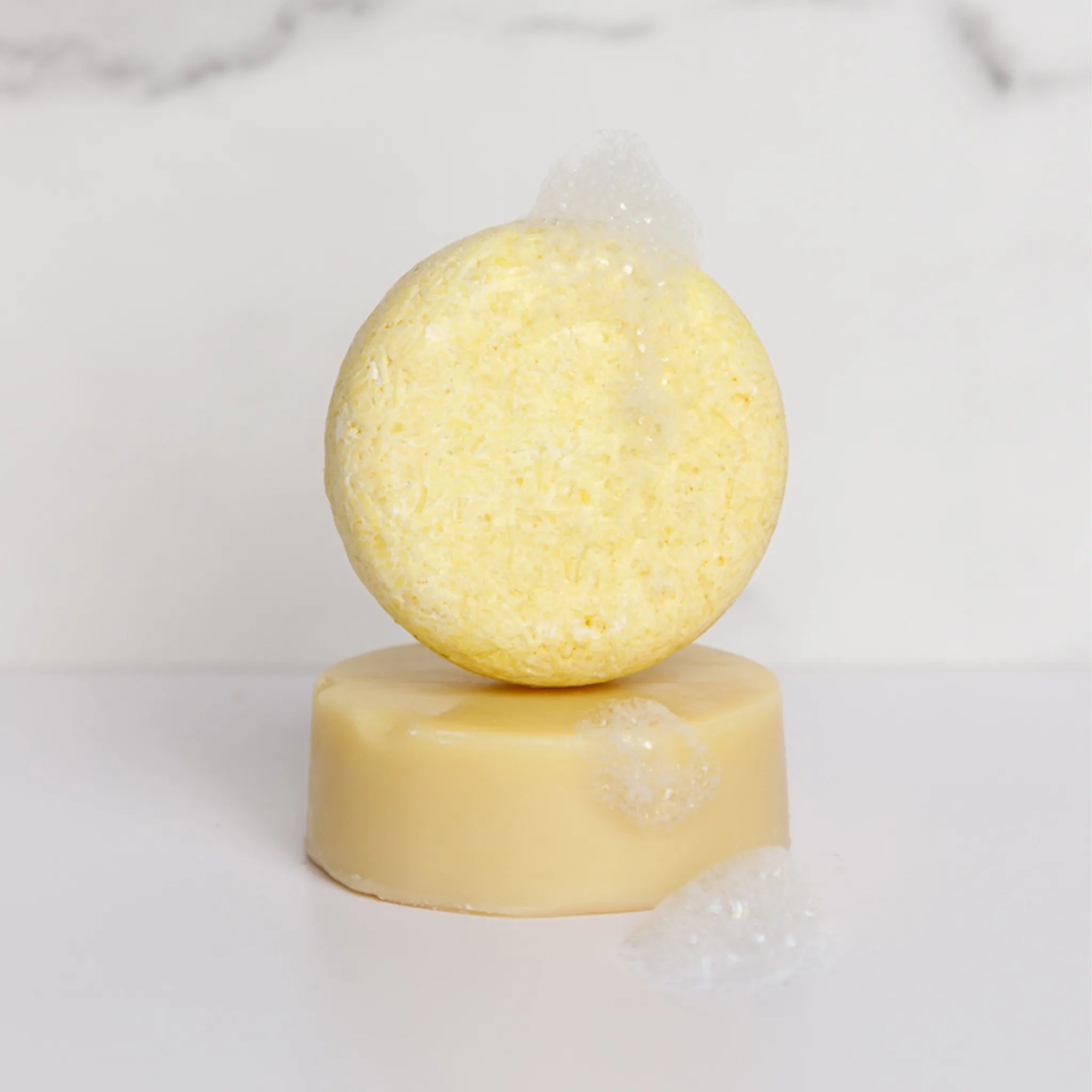 ginger shampoo on top of ginger conditioner