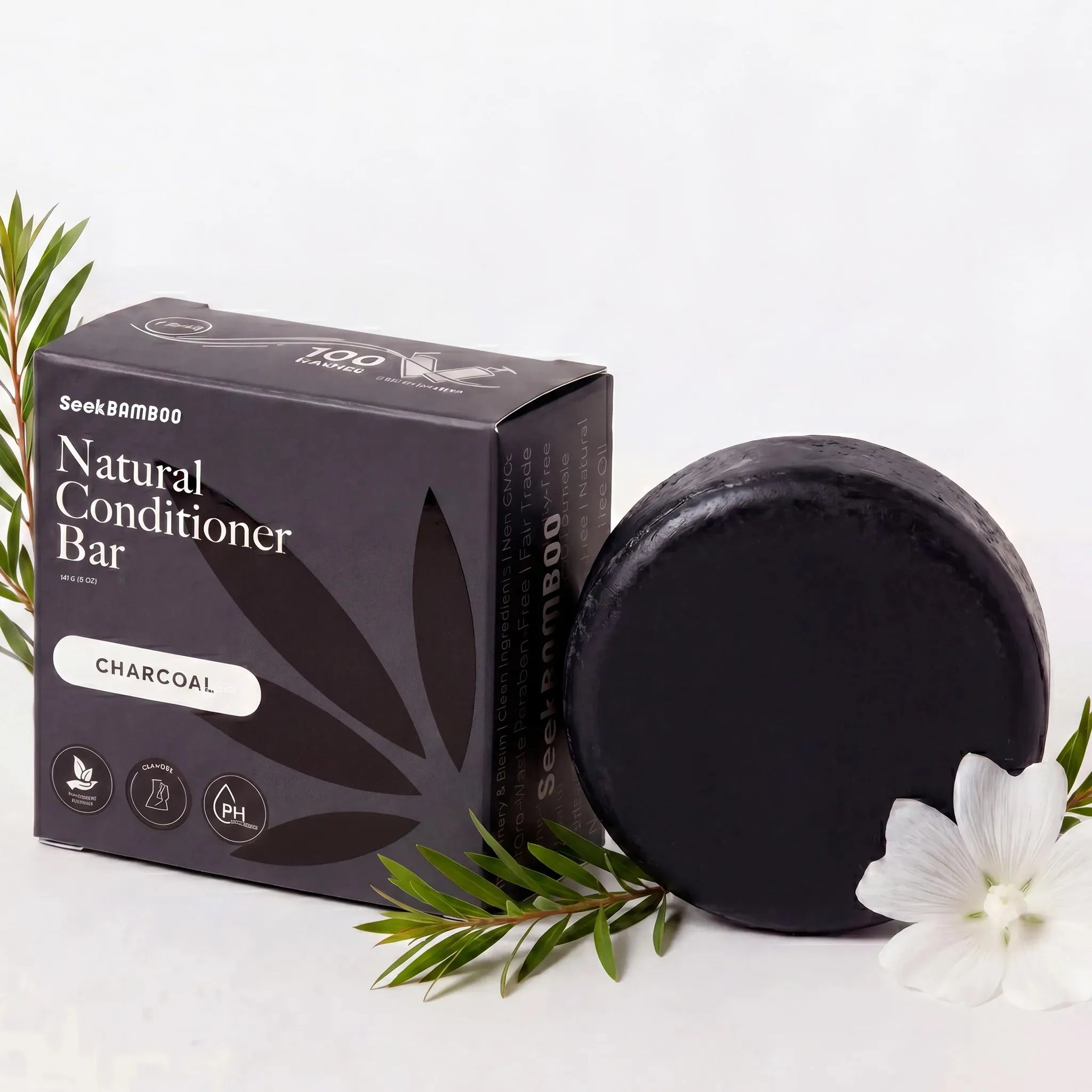 Charcoal conditioner bar with packaging on a white background