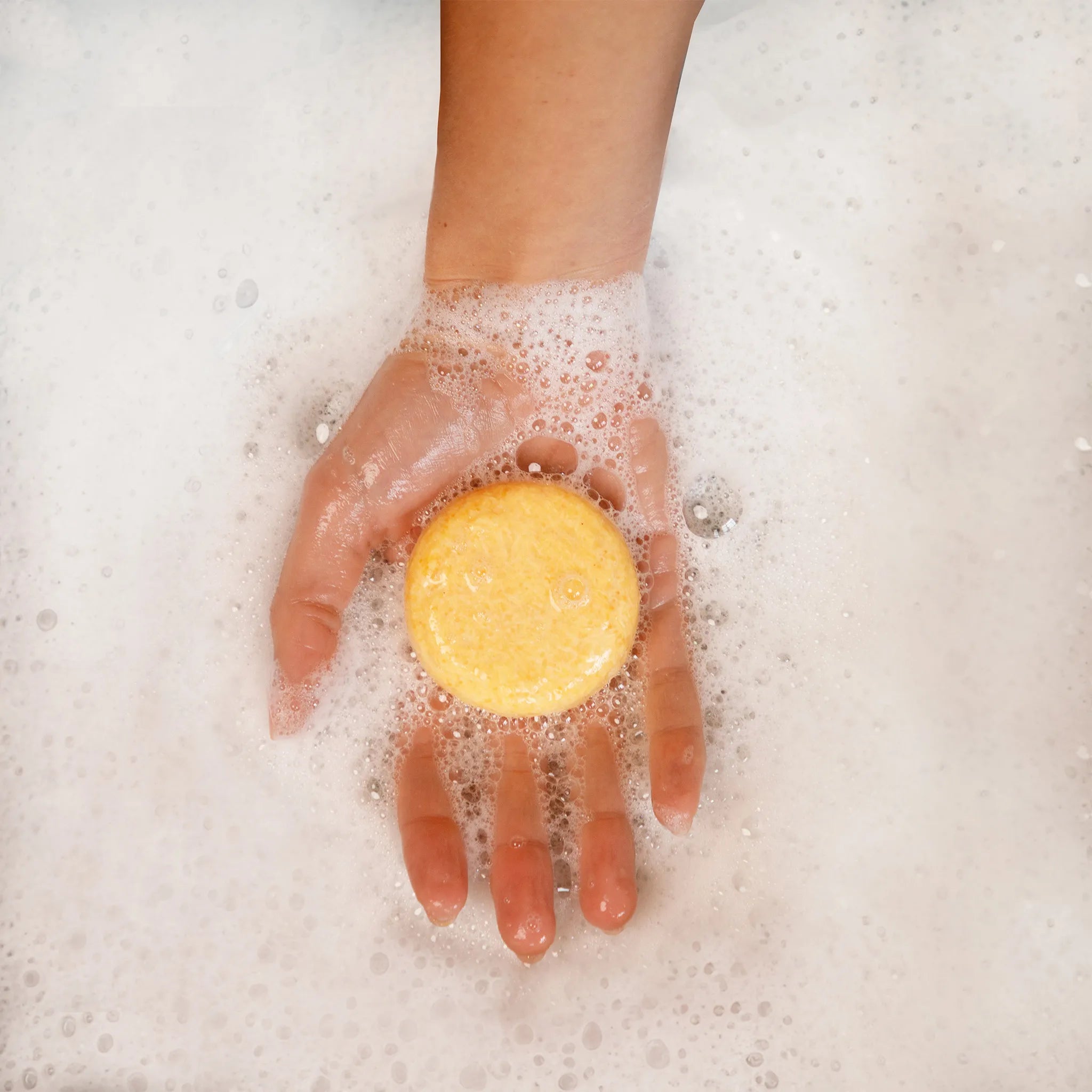 honey shampoo bar with suds