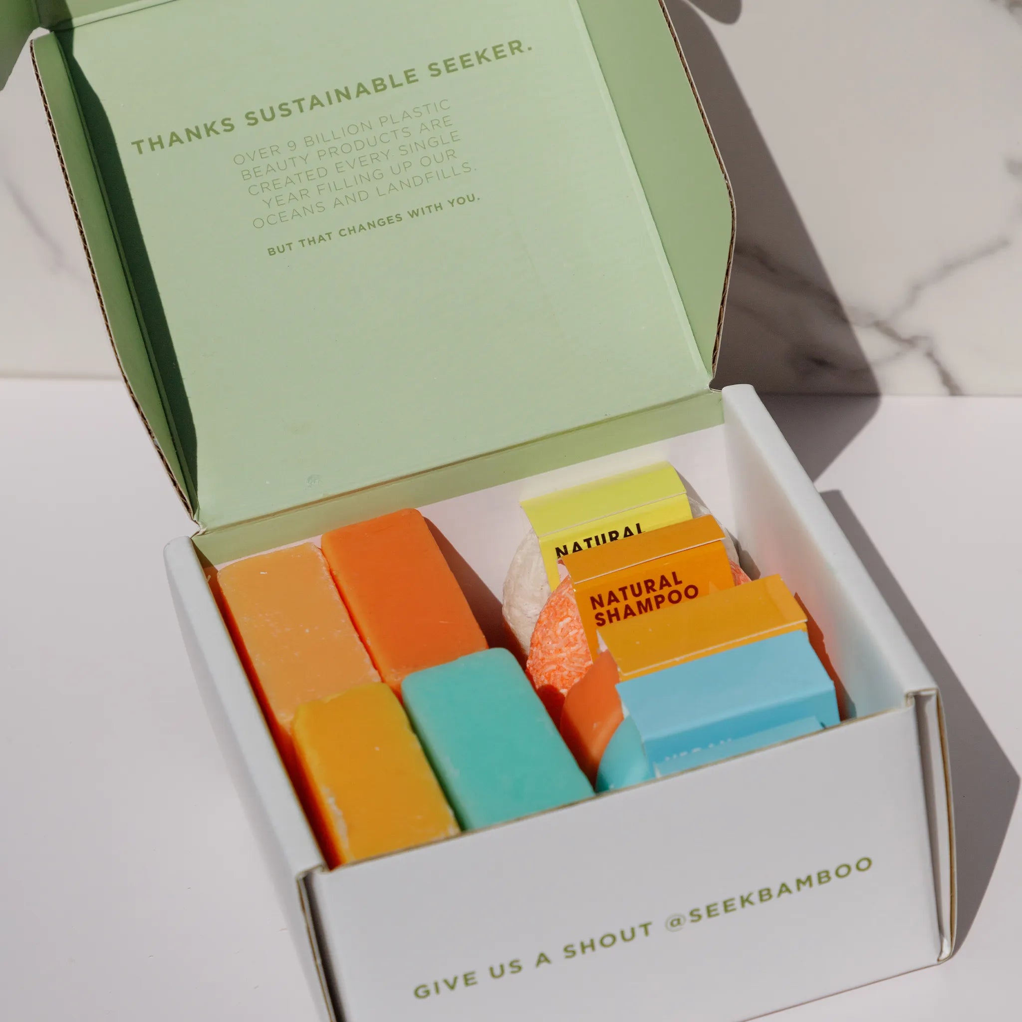 shampoo in soap in a branded seek bamboo box