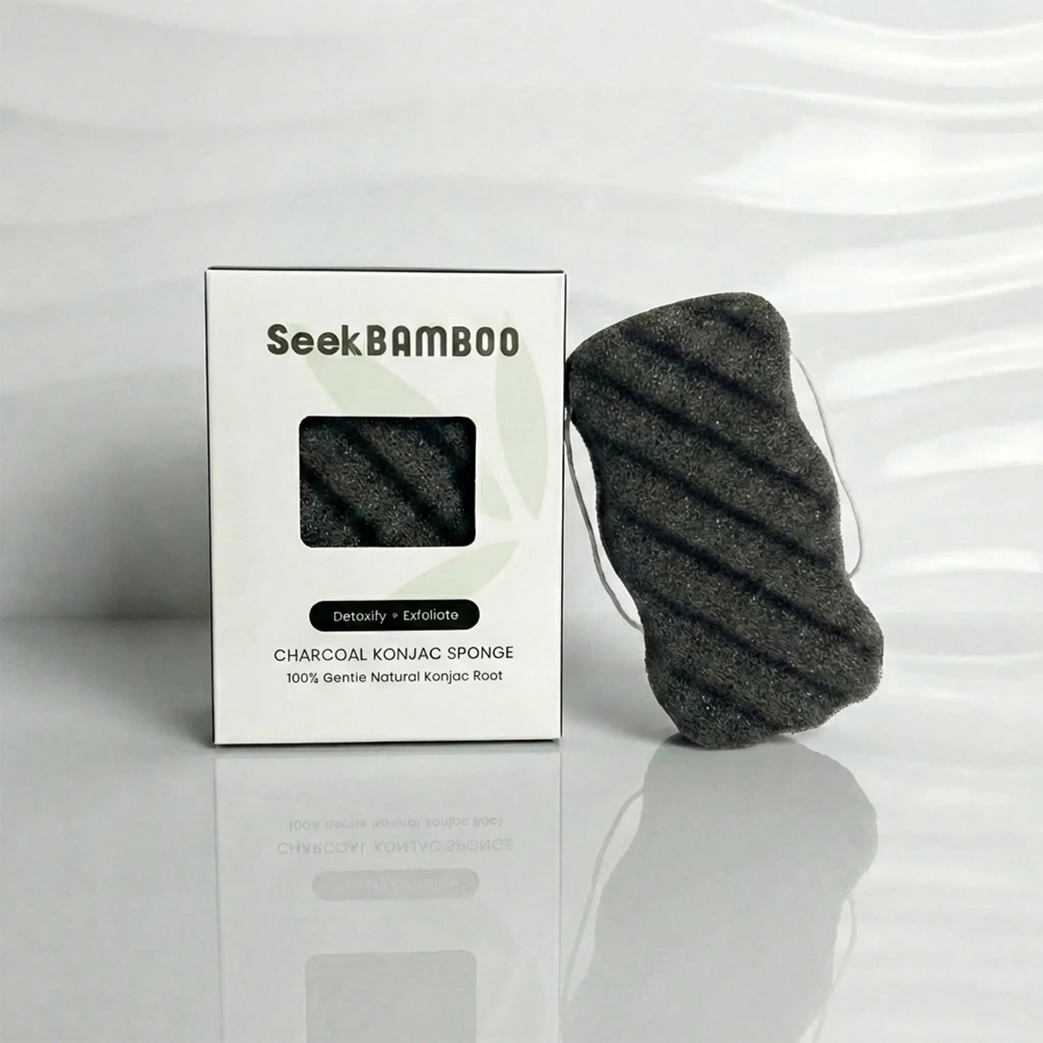 Seek Bamboo charcoal konjac sponge with packaging on a white background