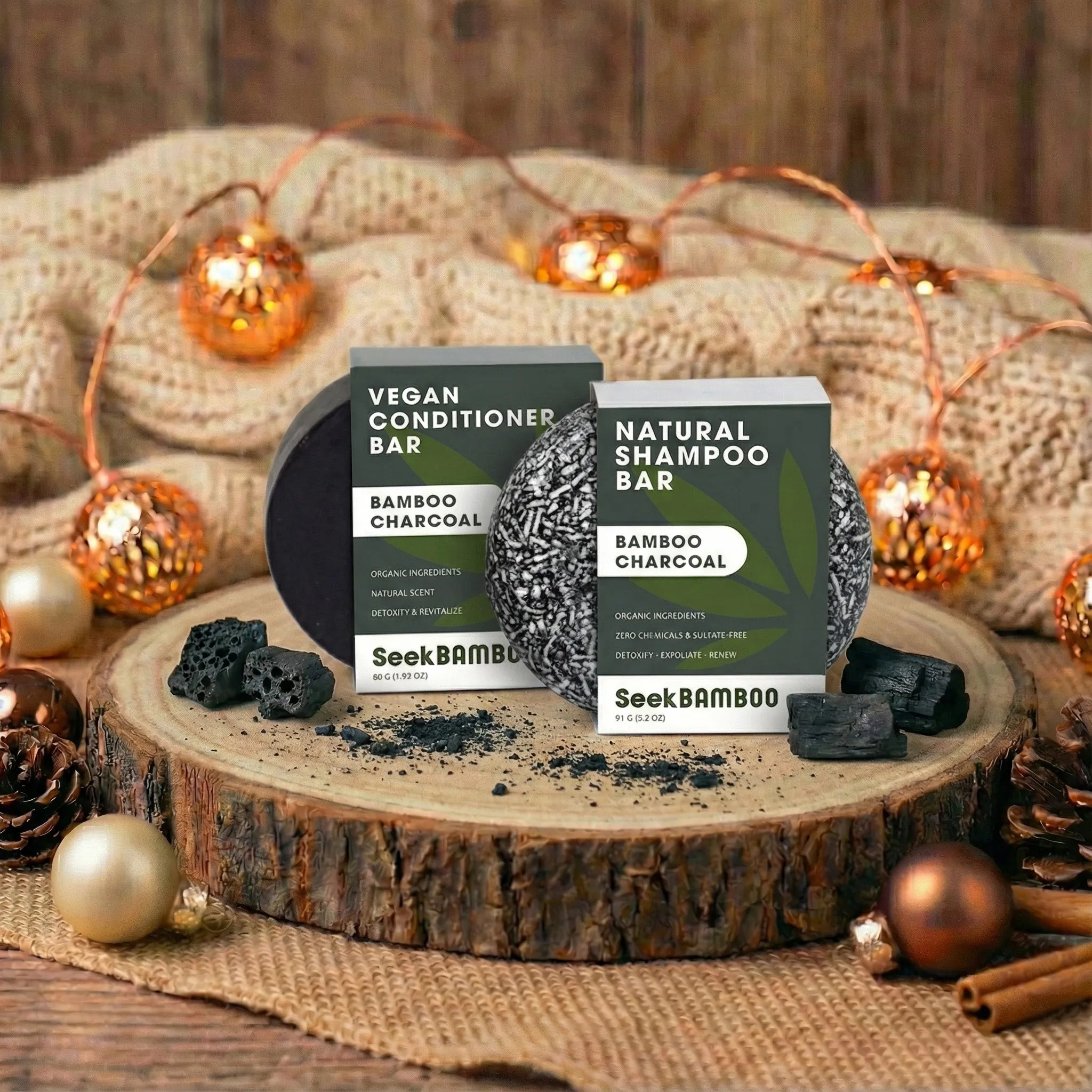 Seek Bamboo bamboo charcoal shampoo and conditioner bars on a wooden surface with decorative lights and pinecones.