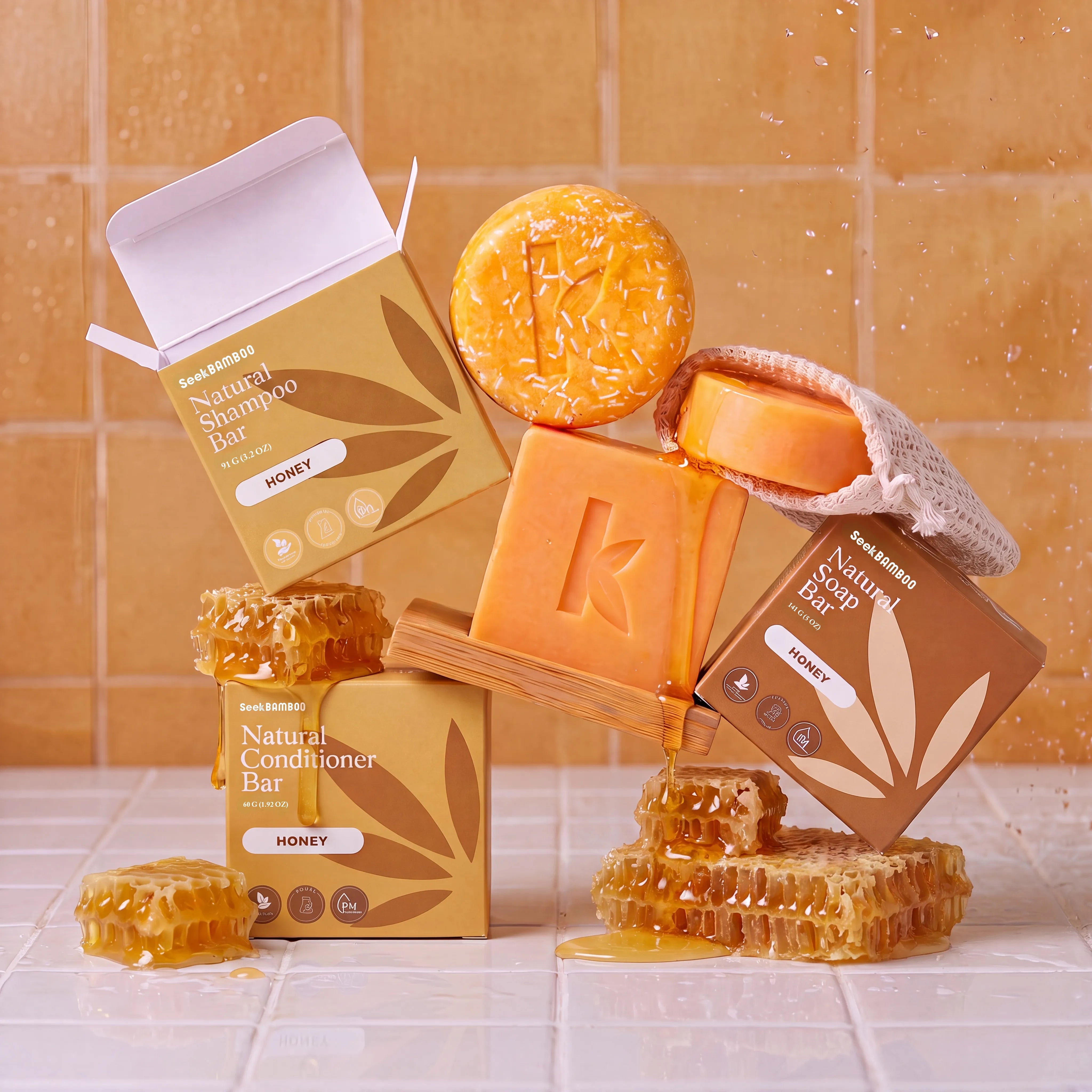 Seek Bamboo Honey shampoo and conditioner bars with packaging on a tiled surface.