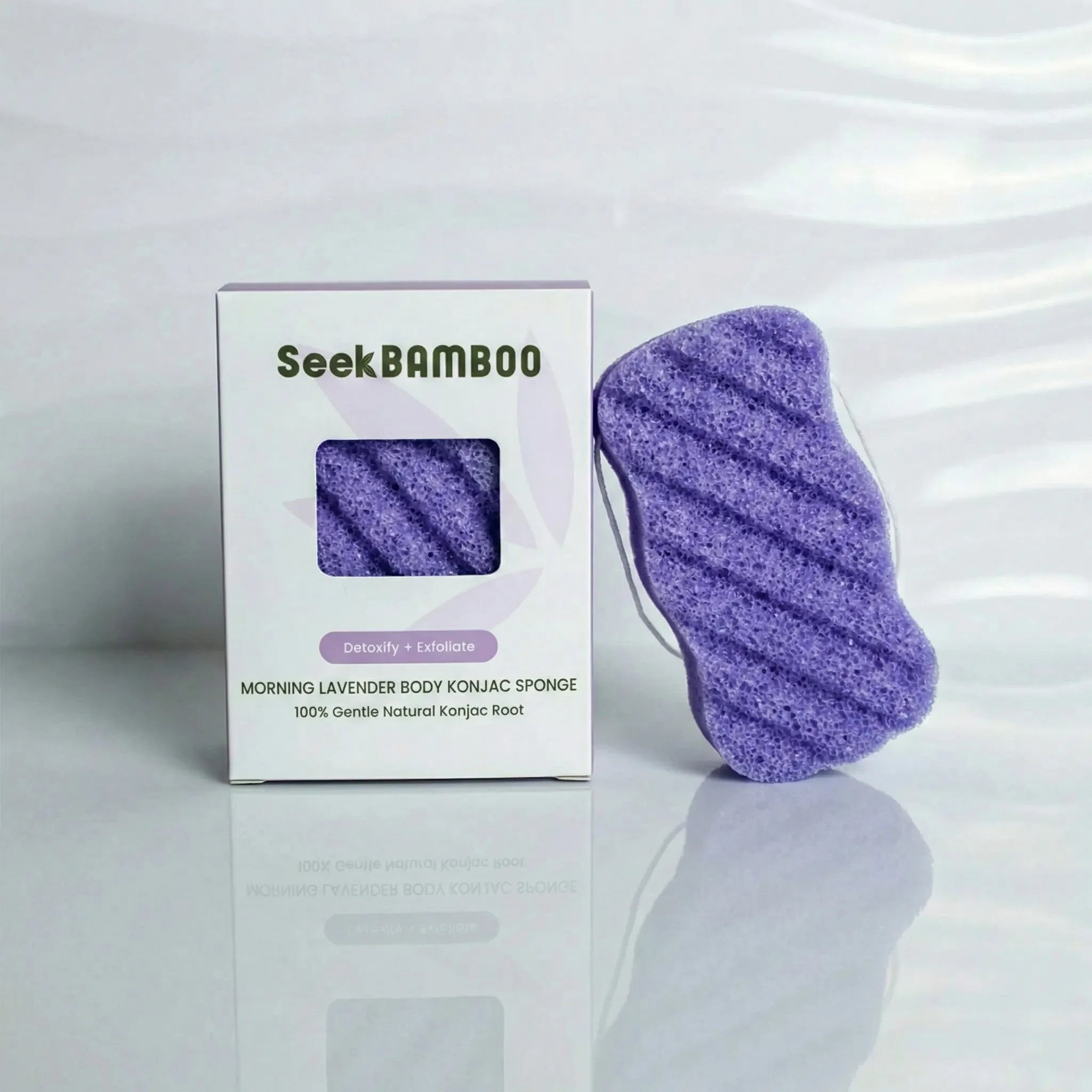 lavender body sponge with Seek Bamboo packaging on a white background