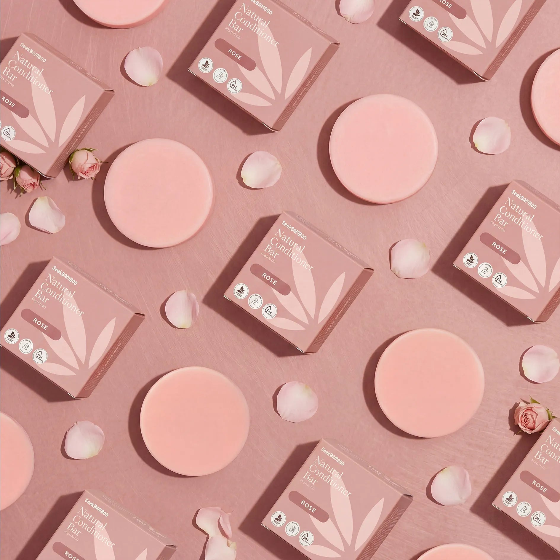 Rose Conditioner Bars By Seek-Bamboo In a pattern with light pink background