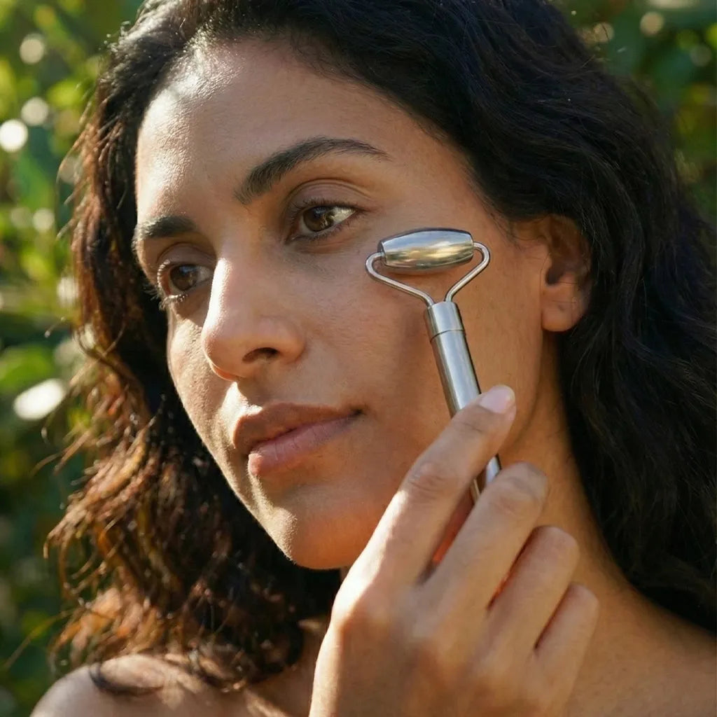 Seek Bamboo Stainless Steel Facial Roller used on womans face