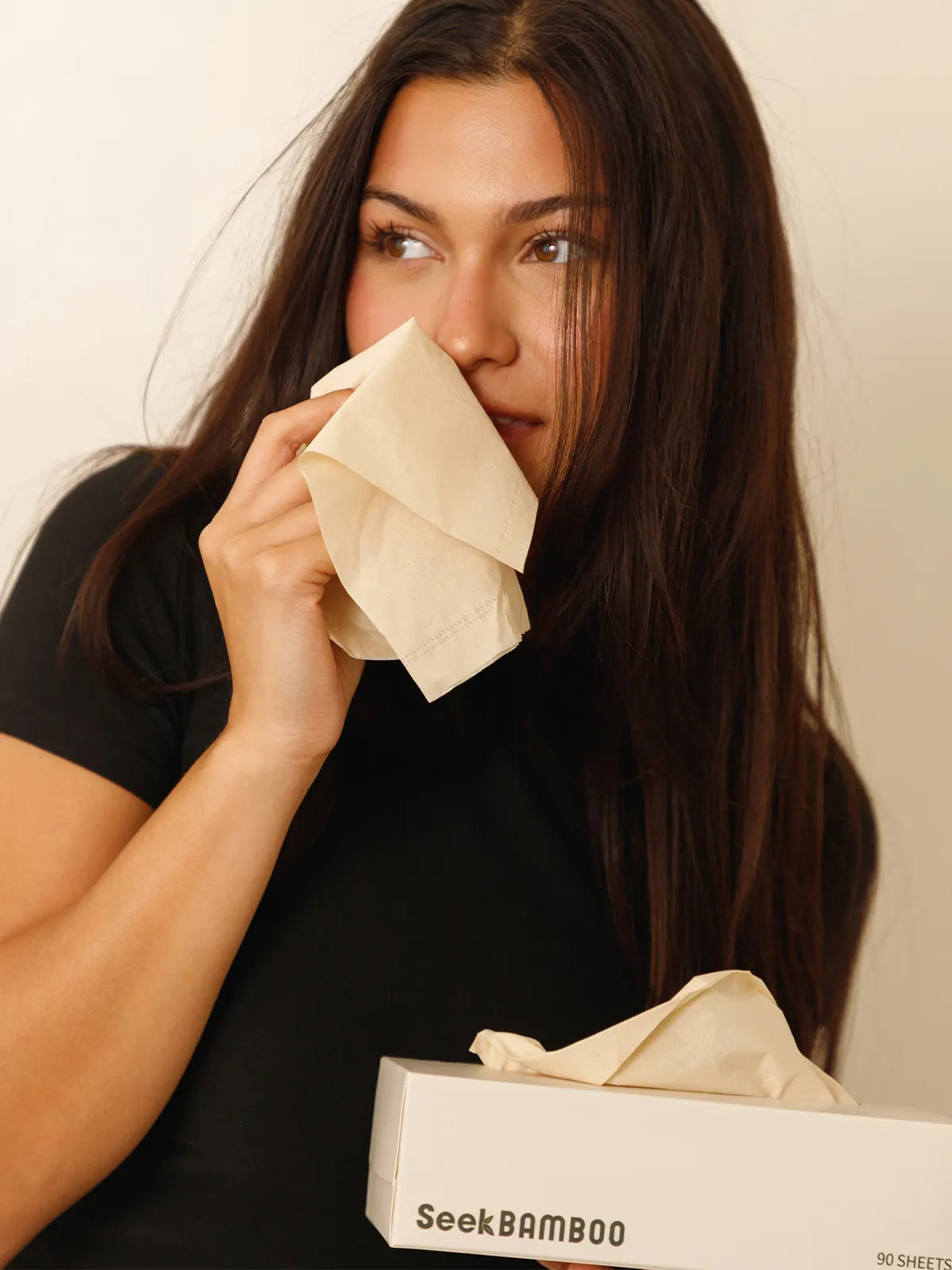 Bamboo Tissues Held To Nose