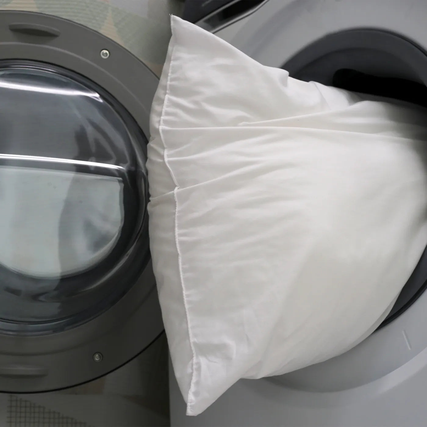 a photo of a bamboo pillow in a laundry machine for a blog cover photo