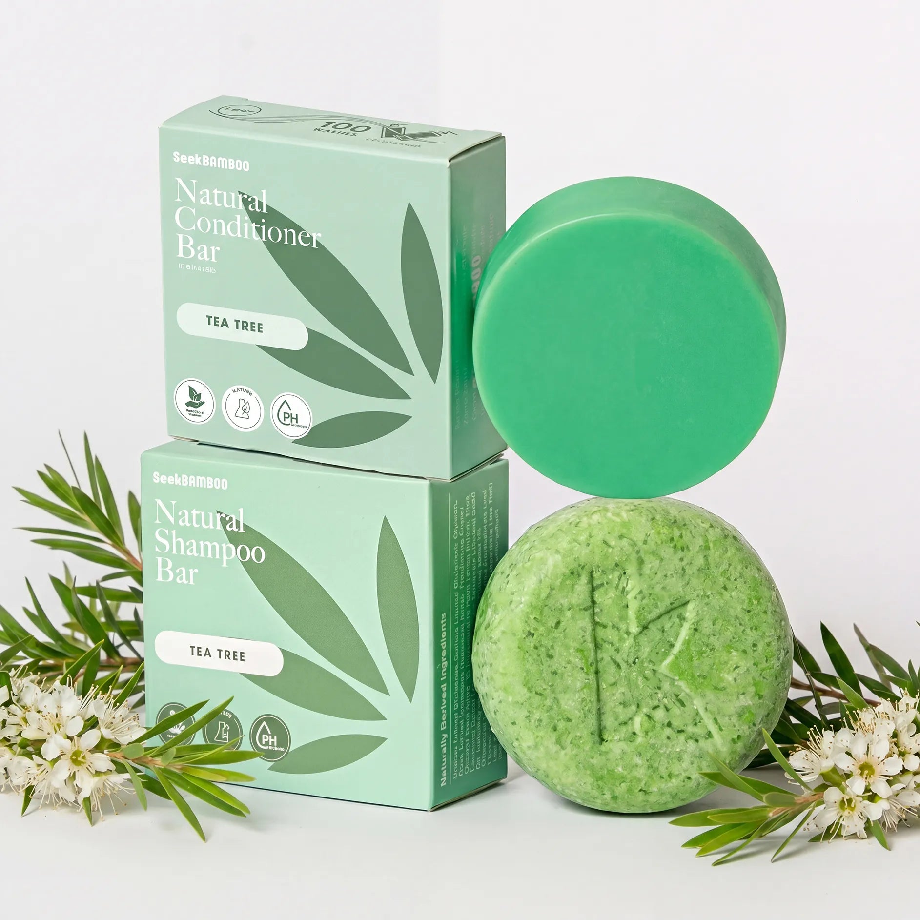 clarifying shampoo and conditioner bars thats tea tree scented with packaging on a white background