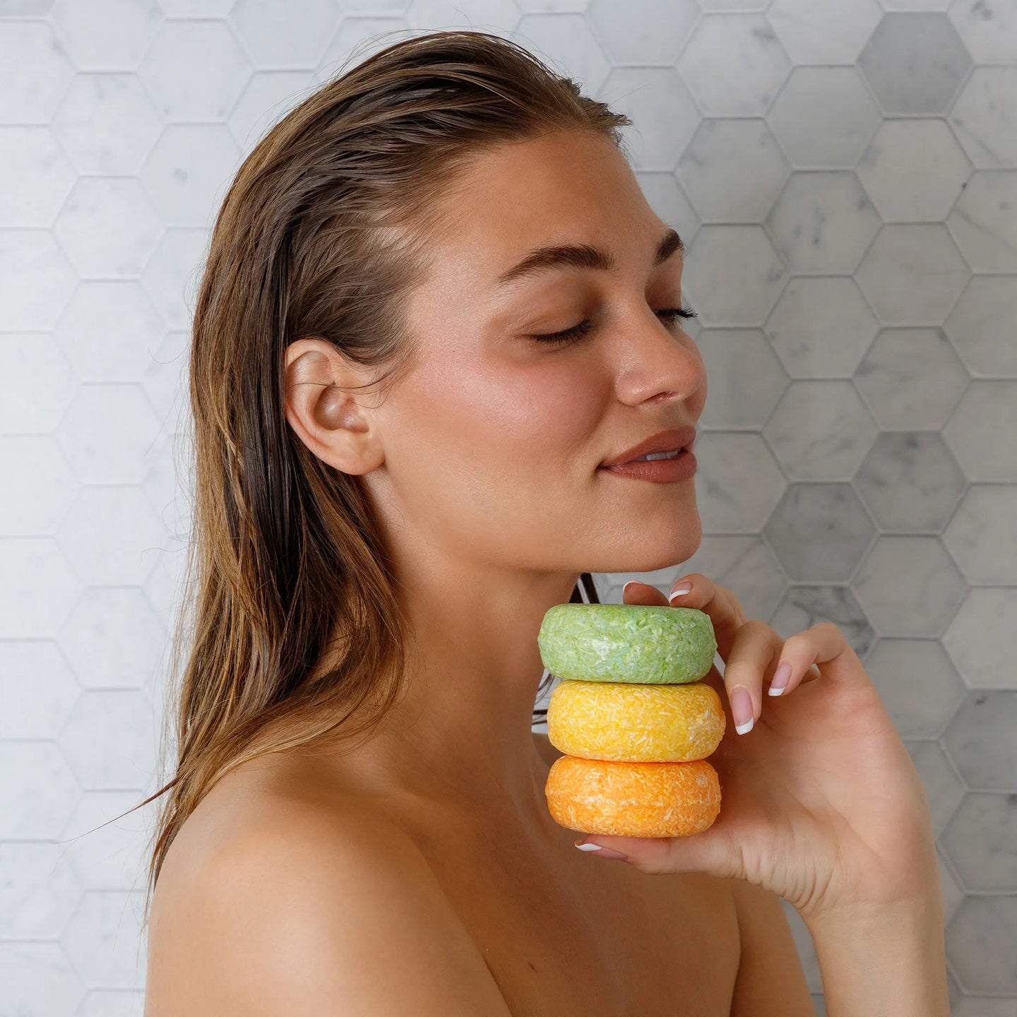 shampoo bar stack held by a woman