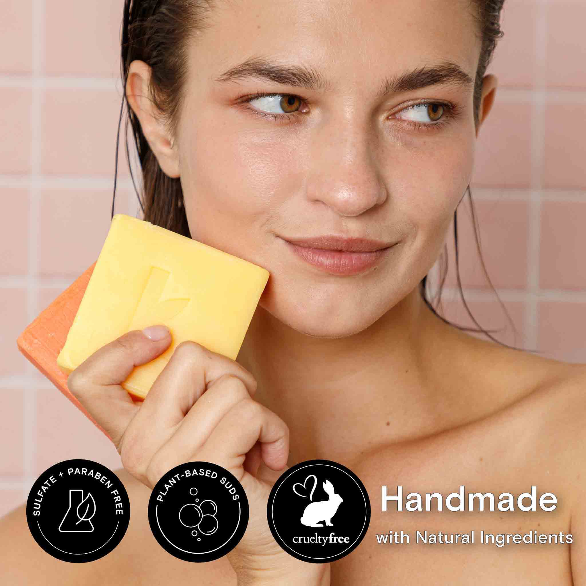 turmeric bar soap being held close to the face